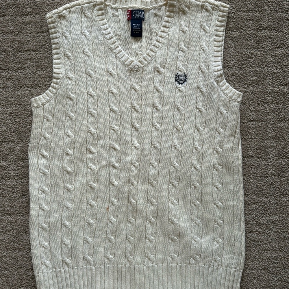 Cable knit cream colored knit vest. 100% cotton chunky, cabled knit by CHAPS.